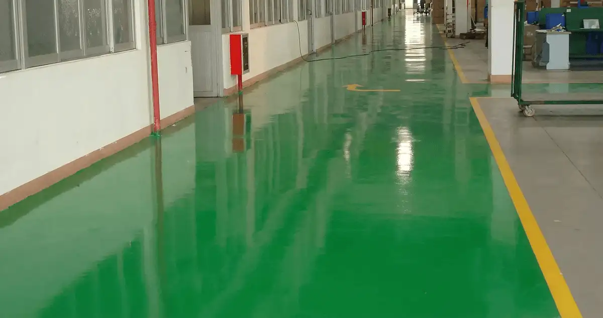 A factory floor professionally covered and marked with epoxy flooring in Eugene, OR