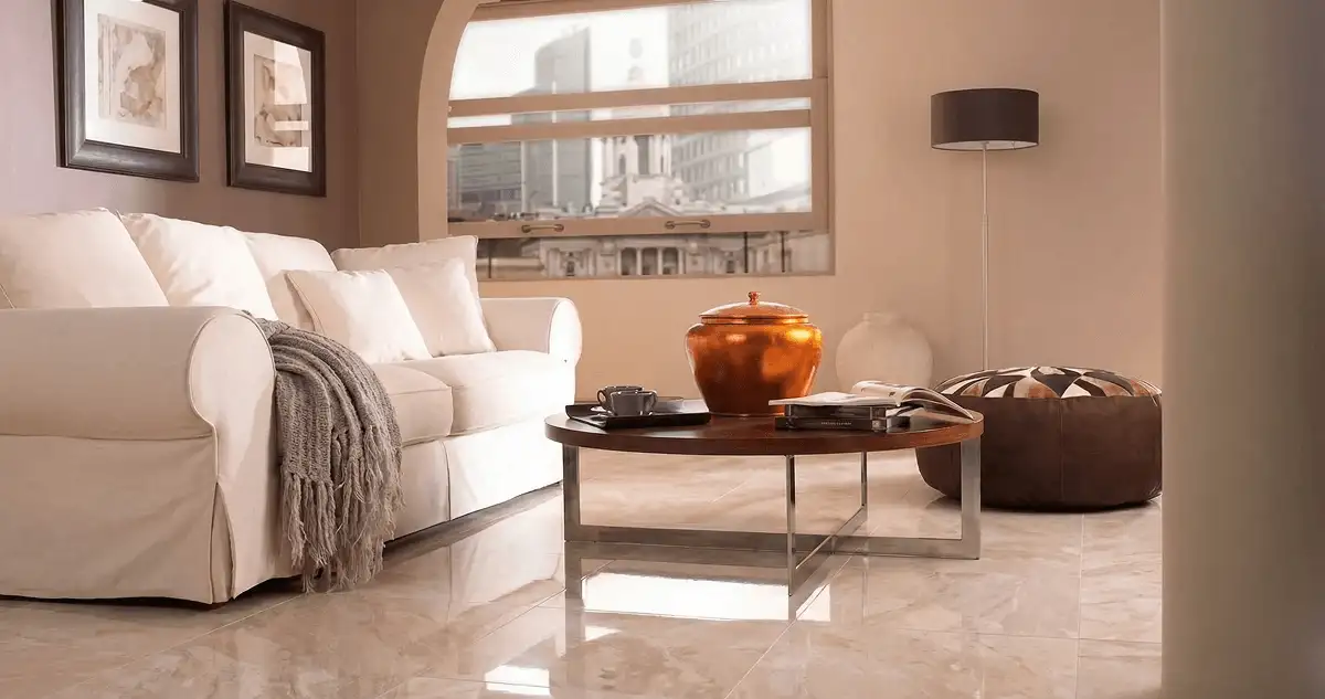 Modern living room with professionally installed marble flooring, a beige sofa, coffee table in Eugene, OR
