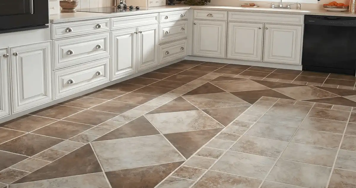 Kitchen with white cabinets and a professionally installed tile floor in Eugene, OR