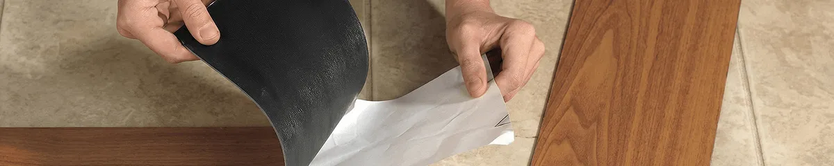 A professional installing vinyl flooring in Eugene, OR