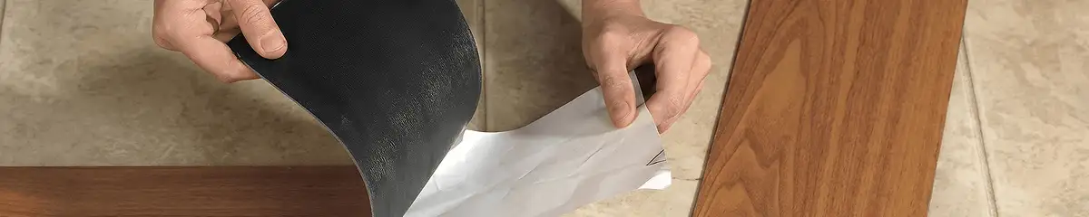 A professional installing vinyl flooring in Eugene, OR