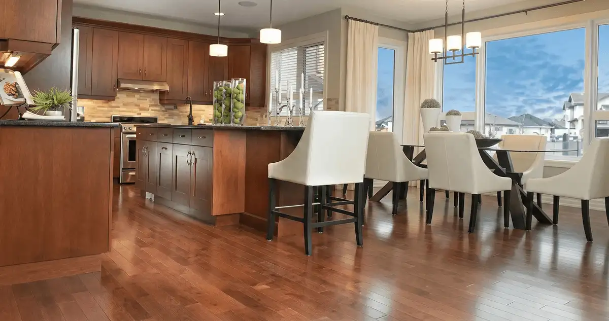 A modern kitchen with professionally installed wood flooring in Eugene, OR